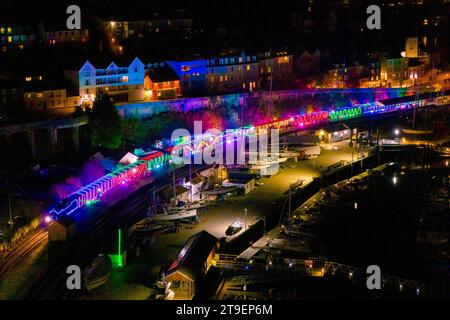 Kingswear, Devon, UK.  24th November 2023.  The Christmas Train of Lights on the Dartmouth Steam Railway in Devon, which runs between 24th November to 30th December 2023, is at Kingswear in Devon before departing for Paignton.  The carriages and steam locomotives on the festive service are lit inside and out with coloured lights.  Picture Credit: Graham Hunt/Alamy Live News Stock Photo