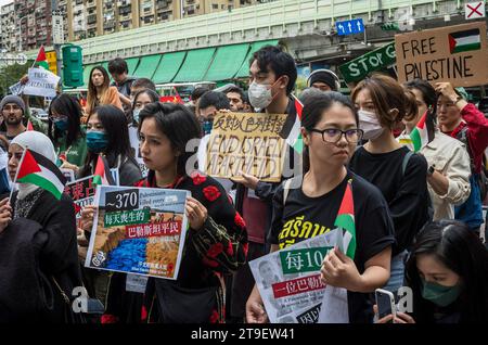 Demonstration Urging Taiwanese Government for Diplomatic Action in Palestinian-Israeli Conflict during a protest in Taipei, Taiwan on 25/11/2023 Protestors call immediate ceasefire and the cessation of Israels illegal occupation and apartheid practices The gathering underscores the urgency for action and the international community's responsibility in the face of the ongoing Palestinian plight. Banners and slogans 'Taiwan Can Help Palestine', Ceasefire Now and Free Palestine reflect solidarity and a call for global accountability. by Wiktor Dabkowski Stock Photo