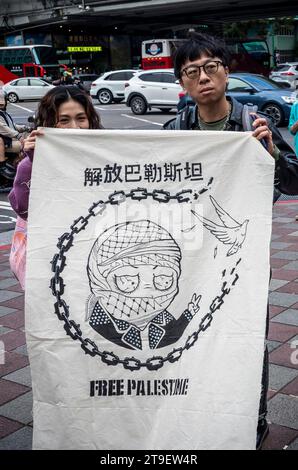 Demonstration Urging Taiwanese Government for Diplomatic Action in Palestinian-Israeli Conflict during a protest in Taipei, Taiwan on 25/11/2023 Protestors call immediate ceasefire and the cessation of Israels illegal occupation and apartheid practices The gathering underscores the urgency for action and the international community's responsibility in the face of the ongoing Palestinian plight. Banners and slogans 'Taiwan Can Help Palestine', Ceasefire Now and Free Palestine reflect solidarity and a call for global accountability. by Wiktor Dabkowski Stock Photo