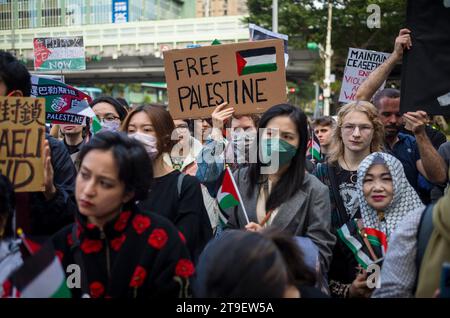 Demonstration Urging Taiwanese Government for Diplomatic Action in Palestinian-Israeli Conflict during a protest in Taipei, Taiwan on 25/11/2023 Protestors call immediate ceasefire and the cessation of Israels illegal occupation and apartheid practices The gathering underscores the urgency for action and the international community's responsibility in the face of the ongoing Palestinian plight. Banners and slogans 'Taiwan Can Help Palestine', Ceasefire Now and Free Palestine reflect solidarity and a call for global accountability. by Wiktor Dabkowski Stock Photo