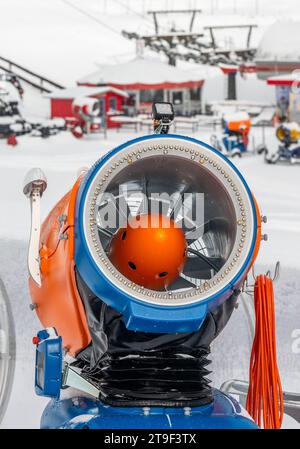 Oberwiesenthal, Germany. 25th Nov, 2023. A snow cannon on the ski slope. There was fresh snow in the Erzgebirge during the night. Credit: Kristin Schmidt/dpa/Alamy Live News Stock Photo