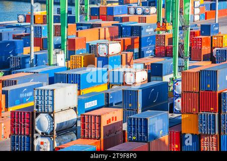 Stacks of cargo containers waiting for shipment. Stock Photo