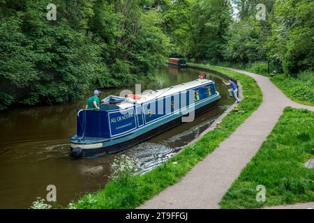 Cannock Chase; Trent and Mersey Canal; Boy Leaps Aboard; Staffordshire; UK Stock Photo