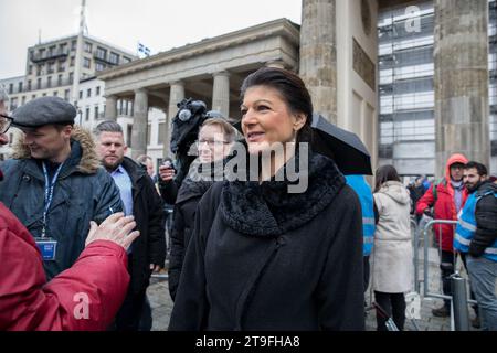Berlin, Germany. 25th Nov, 2023. On November 25, 2023, a peace demonstration titled No to Wars ''“ Stop the Arms Madness ''“ Shape a Peaceful and Fair Future occurred at the Brandenburg Gate in Berlin, Germany. Various groups and figures, including former Left Party member Sahra Wagenknecht, called for the demonstration. The organizers condemned the Russian incursion into Ukraine and criticized NATO. They demanded solidarity with Ukraine, a ceasefire, and negotiations and called for no further arms shipments to Ukraine. During her speech at the event, Sahra Wagenknecht, a prominent figure i Stock Photo