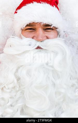 Close-up portrait of a young Santa Claus Stock Photo