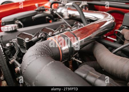 Detail of the engine of a restored car on display at a vintage car fair in the city of Londrina, Brazil. Annual vintage car meeting. Stock Photo