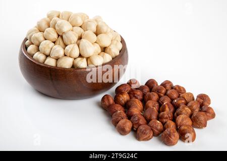Group of peeled and shelled hazelnuts on white background Stock Photo