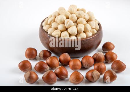 Group of peeled and shelled hazelnuts on white background Stock Photo