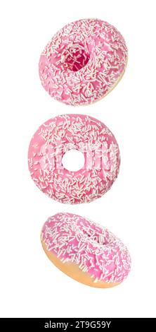 Donuts with pink glaze  falling, hanging, flying, soaring isolated on white background, set for packaging design. Full depth of field. Stock Photo