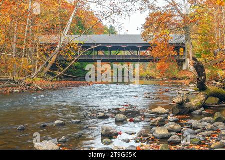 Mohican Covered Bridge spanning over clear fork Mohican river in autumn. Mohican State Park. Perrysville. Ohio. USA Stock Photo