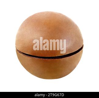 Macadamia, one whole unbroken nut isolated on a white background with clipping path. Full depth of field. Stock Photo