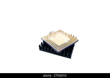 Microprocessor with a heat sink lying on a white surface, isolated on white Stock Photo