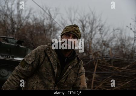 Chasiv Yar, Donetsk Oblast, Ukraine. 25th Nov, 2023. A soldier poses in front of his BMP.The city of Chasiv Yar continues to come under heavy fire from Russian positions outside the city. (Credit Image: © Madeleine Kelly/ZUMA Press Wire) EDITORIAL USAGE ONLY! Not for Commercial USAGE! Stock Photo