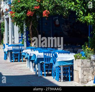 Traditional Greek taverna on a sunny day, in Greece Stock Photo