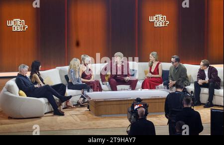 Offenburg, Germany. 25th Nov, 2023. Former footballer Bastian Schweinsteiger (l-r) and his wife, tennis player Ana Ivanovic, Helene Fischer, Shirin David, presenter Thomas Gottschalk and actors Stefanie Stappenbeck, Jan Josef Liefers and Matthias Schweighöfer chat during the ZDF show 'Wetten, dass.?'. Gottschalk hosts 'Wetten, dass.?' for the last time. After 36 years, he ends his career as a betting presenter on November 25. Credit: Philipp von Ditfurth/dpa/Alamy Live News Stock Photo