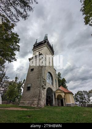 view of The Bolfanek viewtower with the St. Wolfgang´s cemetery chapel. Near a marvelous village Chudenice from 12th century. Czech landmarks Stock Photo