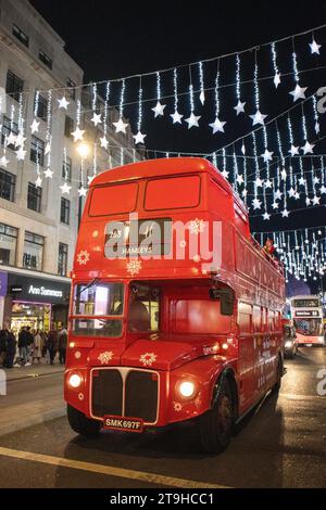 Routemaster Bus under the Oxford Street Christmas Lights, London, UK Stock Photo