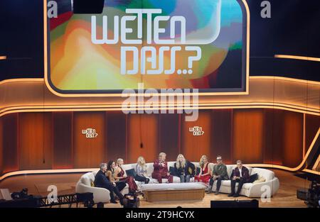 Offenburg, Germany. 25th Nov, 2023. Former footballer Bastian Schweinsteiger (l-r) and his wife, tennis player Ana Ivanovic, Shirin David, Helene Fischer, presenter Thomas Gottschalk, Cher and actors Stefanie Stappenbeck, Jan Josef Liefers and Matthias Schweighöfer chat during the ZDF show 'Wetten, dass.?'. Gottschalk hosts 'Wetten, dass.?' for the last time. After 36 years, he ends his career as a betting presenter on November 25. Credit: Philipp von Ditfurth/dpa/Alamy Live News Stock Photo