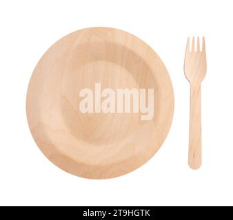 brown wooden fork and plate isolated on white background with clipping path, recyclable garbage, rejection of plastic, eco tableware perfect for bbq a Stock Photo