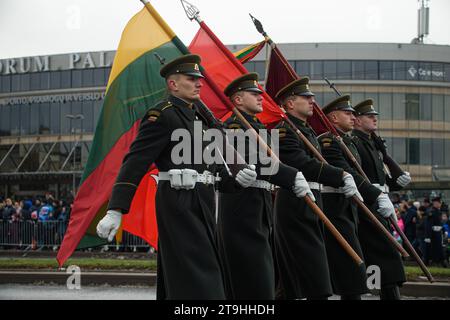 Vilnius, Lithuania. 25th Nov, 2023. Lithuania's military officers march with flags during a military parade on Armed Forces Day in Vilnius. Armed Forces Day honours the restoration of the Lithuania armed forces on November 23, 1918. The military parade commemorating the holiday is being held this year on November 25 in Vilnius. Both Lithuanian military and allies from NATO countries took part in the parade, totaling about 1,400 people and 100 pieces of military equipment. (Photo by Yauhen Yerchak/SOPA Images/Sipa USA) Credit: Sipa USA/Alamy Live News Stock Photo