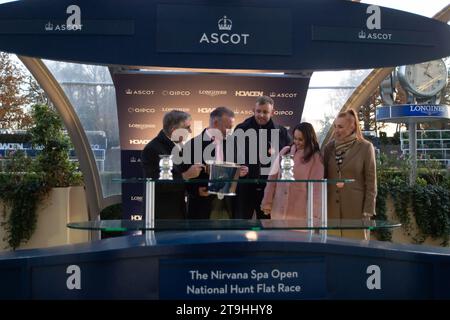 Ascot, Berkshire, UK. 25th November, 2023. The Winners Presentation. Horse Regent’s Stroll ridden by jockey Harry Cobden (pink silks) wins the Nirvana Spa Open National Hunt Flat Race at the November Racing Saturday Meeting at Ascot Racecourse. This was the fourth win of the day for jockey Harry Cobden and trainer Paul Nicholls. Owner Chris Giles. Trainer Paul Nicholls. Breeder Rita Kent. Sponsor Morton Group. Credit: Maureen McLean/Alamy Live News Stock Photo