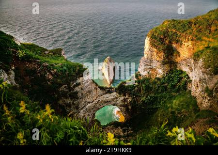 The coast of Etretat (Normandy) is located on the so-called Limestone Coast (pas de Caux) . Similar cliffsin England : white cliffs of Dover. Sheer cl Stock Photo