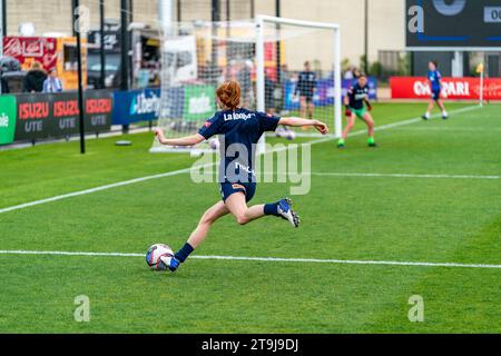 Bundoora, Australia. 26 November, 2023. Midfielder Beattie Goad (#6) crosses the ball into the box in pre-game training. Credit: James Forrester/Alamy Live News Stock Photo