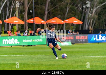 Bundoora, Australia. 26 November, 2023. Forward McKenzie Weinert (#11) takes a shot at goal during pre-game training. Credit: James Forrester/Alamy Live News Stock Photo