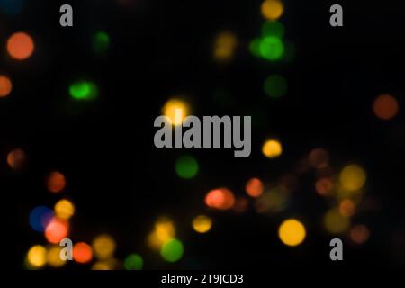 Abstract blurred glittering shine bulbs lights background. Sparkle circle lit celebrations display. Stock Photo