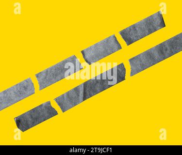 Set of different black sticky tapes. Torn crumpled sellotape pieces isolated on yellow background Stock Photo