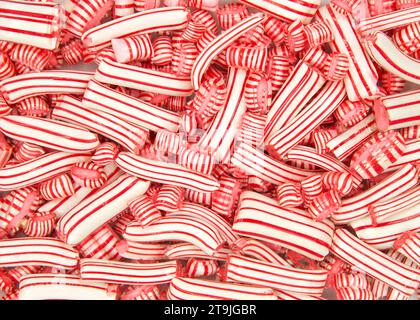 Close up on small and long traditional peppermint candy. Bite sized pieces. Traditional Classic Christmas candy. Stock Photo