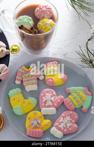 Christmas marshmallows. Winter candy. Sweet food for ugly sweater party in december Stock Photo
