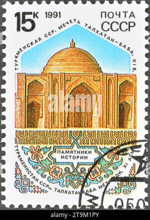 Cancelled postage stamp printed by Soviet Union, that shows Talkhatan-Baba Mosque, Turkmen SSR (XI c.), Historical Architecture, circa 1991. Stock Photo