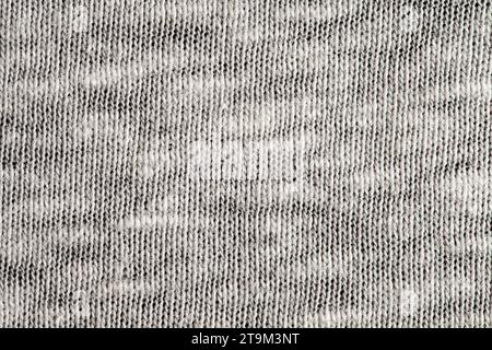 Knitted wool fabric, white threads, background structure, close-up macro view Stock Photo