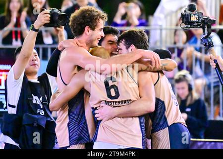 Hong Kong, China. 26th Nov, 2023. Players of Amsterdam HiPRO celebrate after winning the final between Amsterdam HiPRO of the Netherlands and Raudondvaris Hoptrans of Lithuania at the 2023 3X3 World Tour Hong Kong Masters in Hong Kong, south China, Nov. 26, 2023. Credit: Zhu Wei/Xinhua/Alamy Live News Stock Photo