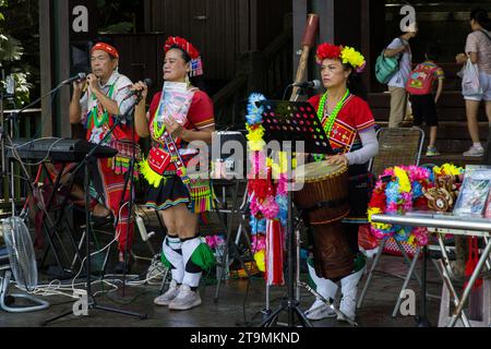 Sun Moon Lake,  Yuchi,  Taiwan - October 9, 2023: Taiwanese indigenous Thao Street Singers and Bands performing in Xuanguang Temple with traditional d Stock Photo