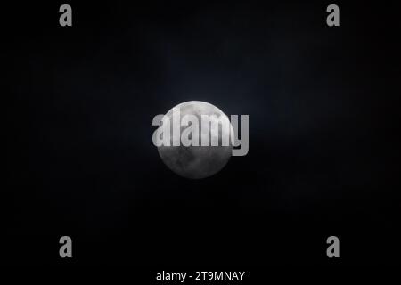 Full moon covered with clouds in the winter, Waldviertel, Austria Stock Photo