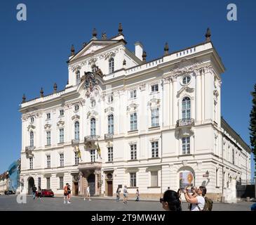 Prague, Bohemia – CZ – June 3, 2023 Horizontal view of tourists at the Archbishop Palace at Prague Castle, a landmark 18th-century palace known for it Stock Photo