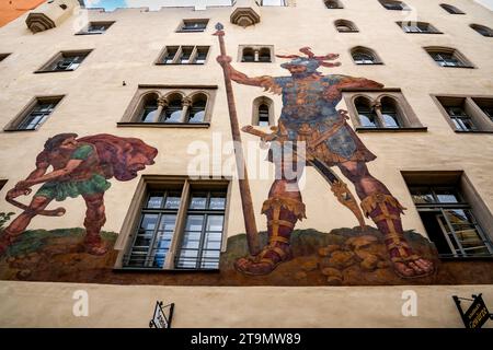 Regensburg, Bavaria, DE - June 5, 2023 Horizontal view of medieval Regensburg’s Goliathstrasse (Goliath street) with its monumental mural of David ver Stock Photo