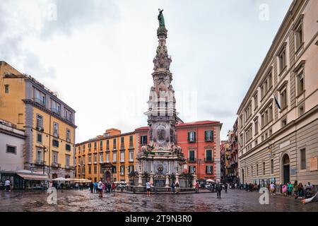 The Obelisk or spire of the Immaculate Conception or Guglia dell'Immacolata is a Baroque obelisk in Naples located in Piazza del Gesu Nuovo Stock Photo