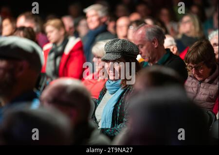 Hay-on-Wye, Wales, UK. Sunday 26th November 2023. Audience of Hay Festival Winter Weekend at Night. Credit: Sam Hardwick/Alamy Live News. Stock Photo
