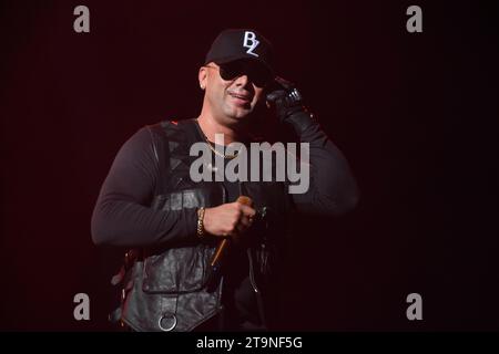 Mexico City, Mexico. 25th Nov, 2023. Juan Luis Morera, known as Wisin of the Puerto Rican Reggaeton duo Wisin & Yandel, is performing on stage as part of the 'Coca Cola Flow Fest 2023' Reggaeton music festival at Autodromo Hermanos Rodriguez in Mexico City, Mexico, on November 25, 2023. (Photo by Essene Hernandez/Eyepix Group) Credit: NurPhoto SRL/Alamy Live News Stock Photo