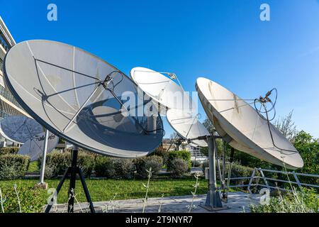 satellite dishes in the outer atrium of the headquarters building of RTP, Portuguese radio and television in Lisbon. Stock Photo
