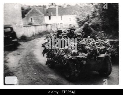 World War Two B&W photo German Soldiers in a Camouflaged VW166 Schwimmwagen on the Normandy Front 1944 . The men are from the 1st SS Panzer Division LSSAH Reconnaissance Company Stock Photo