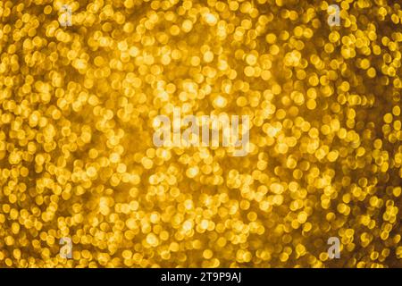 Golden festive background with glittering sequins. New Year background. Christmas texture. Stock Photo