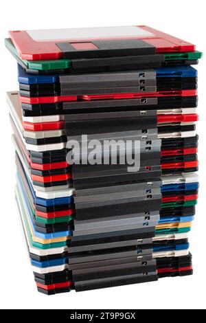 Colored old retro floppy diskettes in stack. Isolated on white background. Stock Photo
