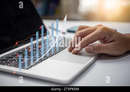 Businessman analyze financial data chart of statistics and graph with arrow. Business strategy development and growing growth plan. Stock Photo