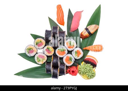 Overhead view of big set of sushi and rolls served on bamboo leaves Stock Photo