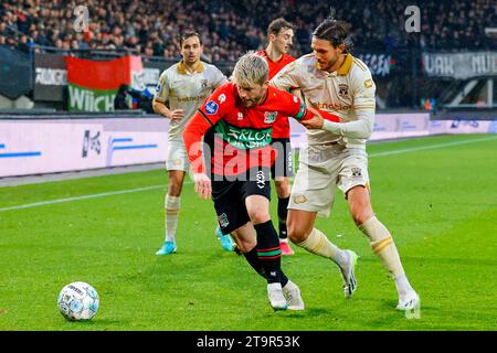 NIJMEGEN, NETHERLANDS - NOVEMBER 26: Lasse Schone (NEC Nijmegen) and Willum Thor Willumsson (Go Ahead Eagles) battle for the ball during the Eredivisi Stock Photo
