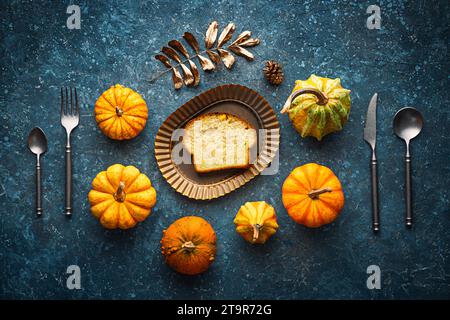 Homemade crusty sourdough bread oven baked made with wheat, activated carbon, pumpkin and curcuma spice and season autumn foods in kitchen Stock Photo